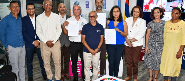 Representatives of the seven organisations awarded GEF Small Grants Programme (SGP) Operational Phase 8 (OP8) grants in Mauritius and Rodrigues pose for a group photo following the launch ceremony.