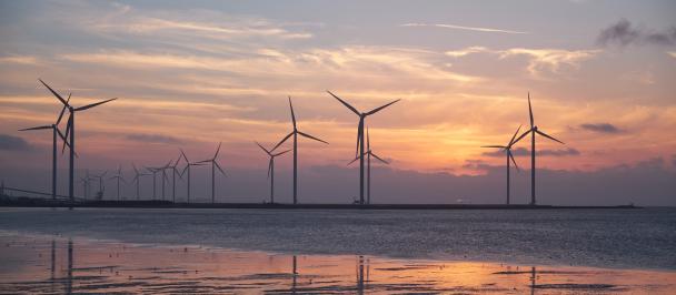 STOCK PHOTO-SDG14-SDG13-SDG7-sunset-ocean-wind turbine-energy-renewable-blue economy.jpg