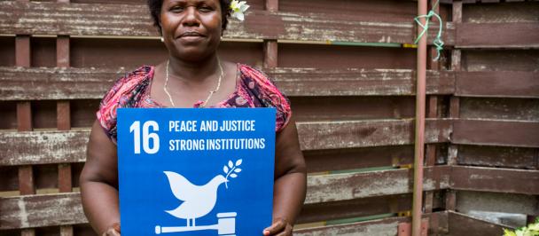 UNDP-PNG-2017_woman_SDG16_sign_34721695031.jpg