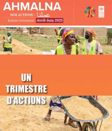 Bulletin cover with banner; construction workers in hard hats on a sandy site beside a wheelbarrow