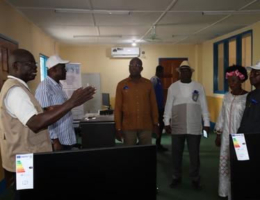 a group of people standing in a room