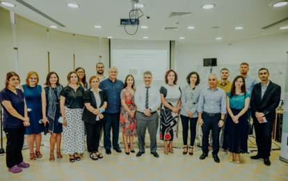 a group of people posing for a photo