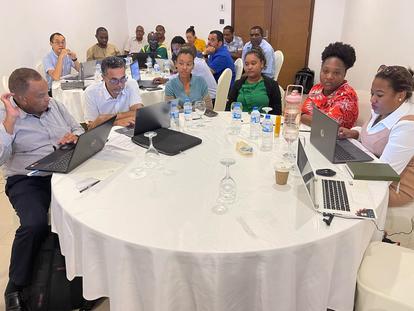 a group of people sitting at a table