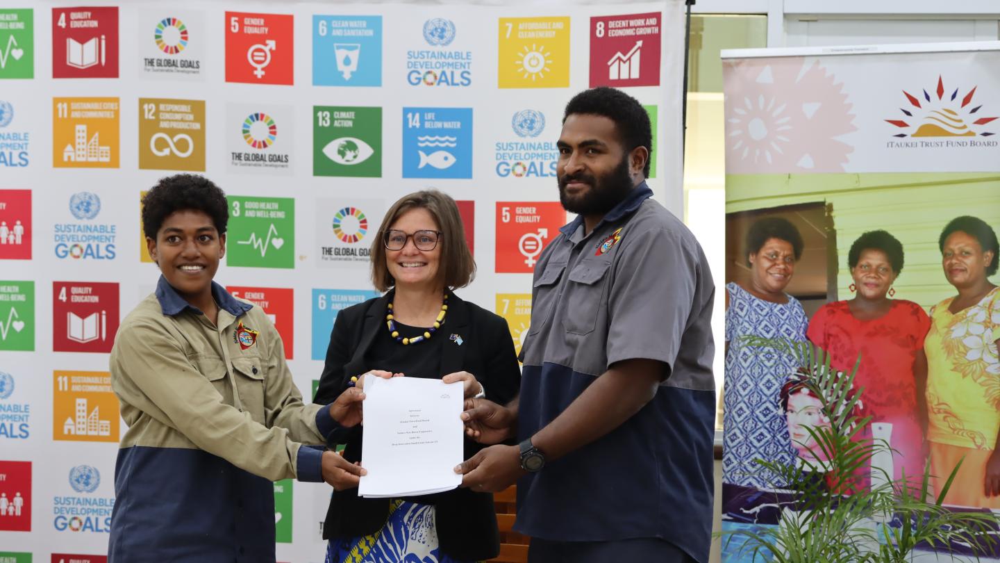 a group of people posing for the camera