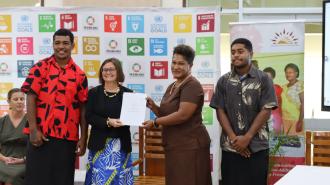 a group of people posing for the camera