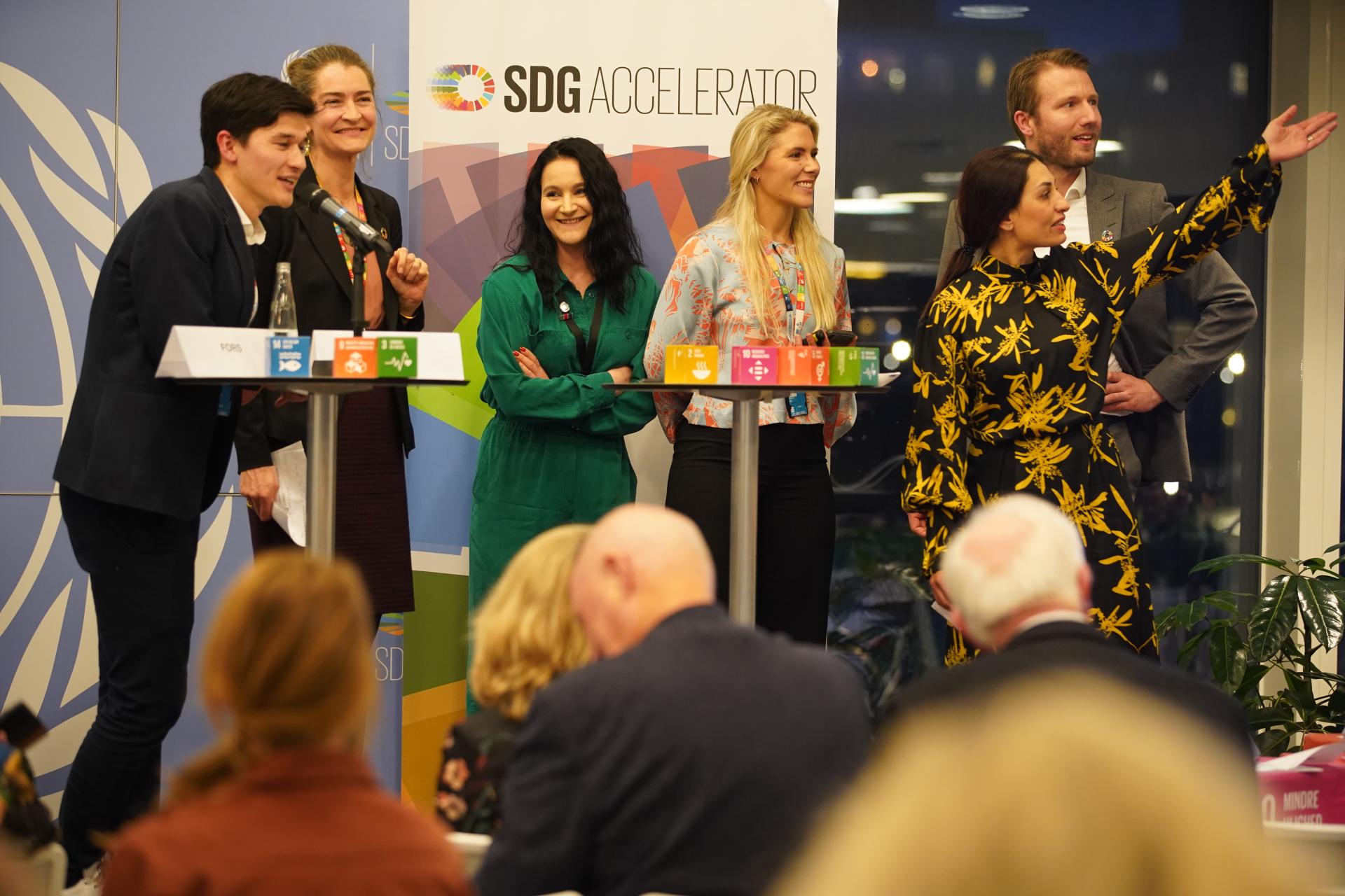 people smiling on stage