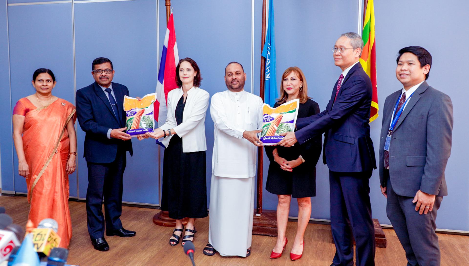 Maize seed packs being handed over by high-level representatives 