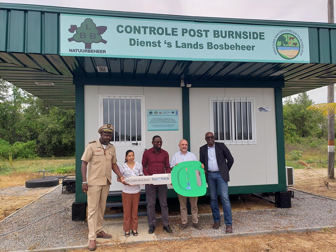 Ceremonial hand over of the field office at Burnside, Coronie. From left to right: District Commissioner of Coronie Mr. M. Winter, Coordinator Nature Conservation Mrs. C. Sakimin, Deputy Director Forest Management, R. Cairo, Head of Cooperation at EU Delegation to Guyana, Surinam and Caribbean, Mr. J. Nadal Sastre and UNDP Programme Specialist Environment Mr. B. Drakenstein