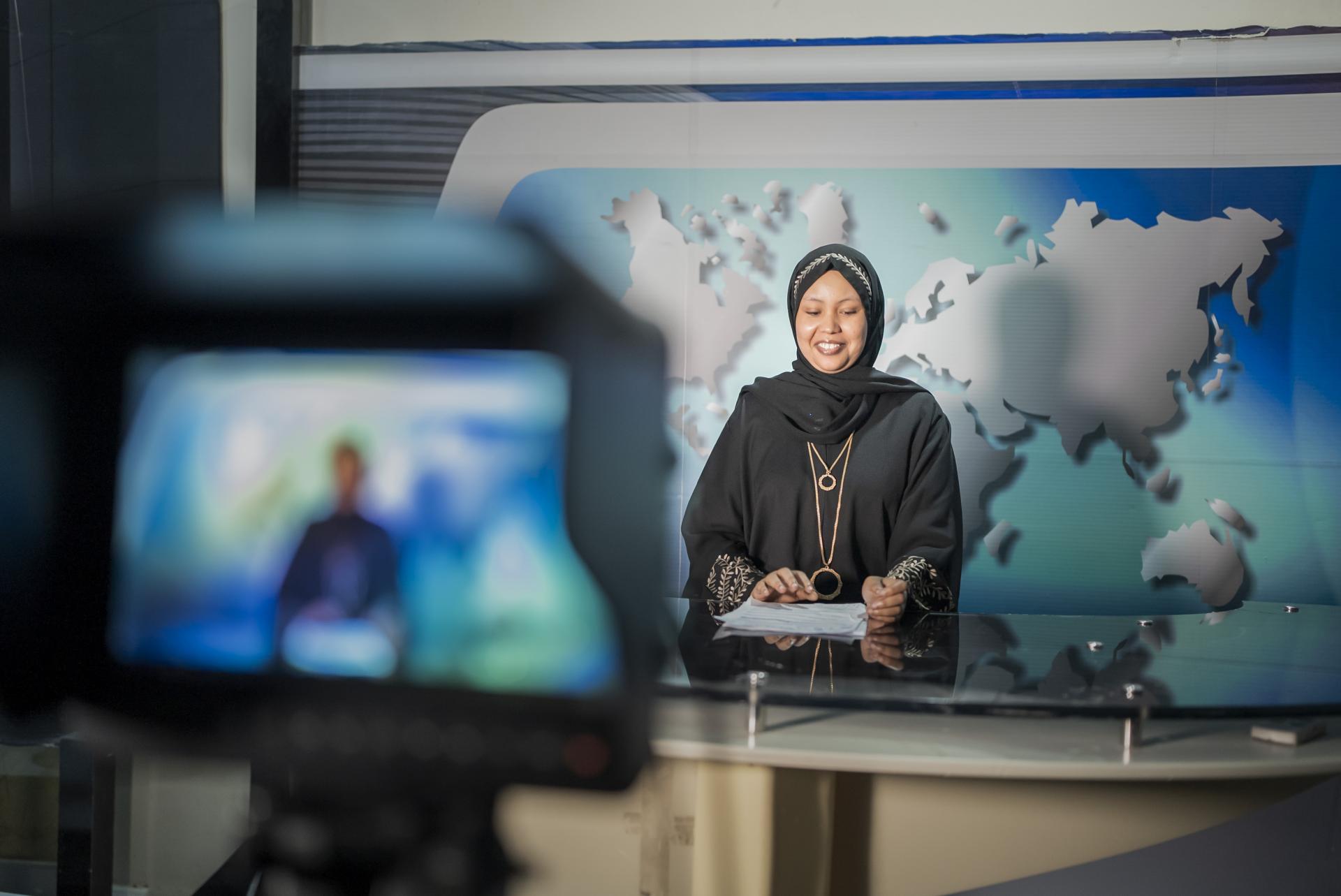 Fathi Mohamed Ahmed on the set of a television programme