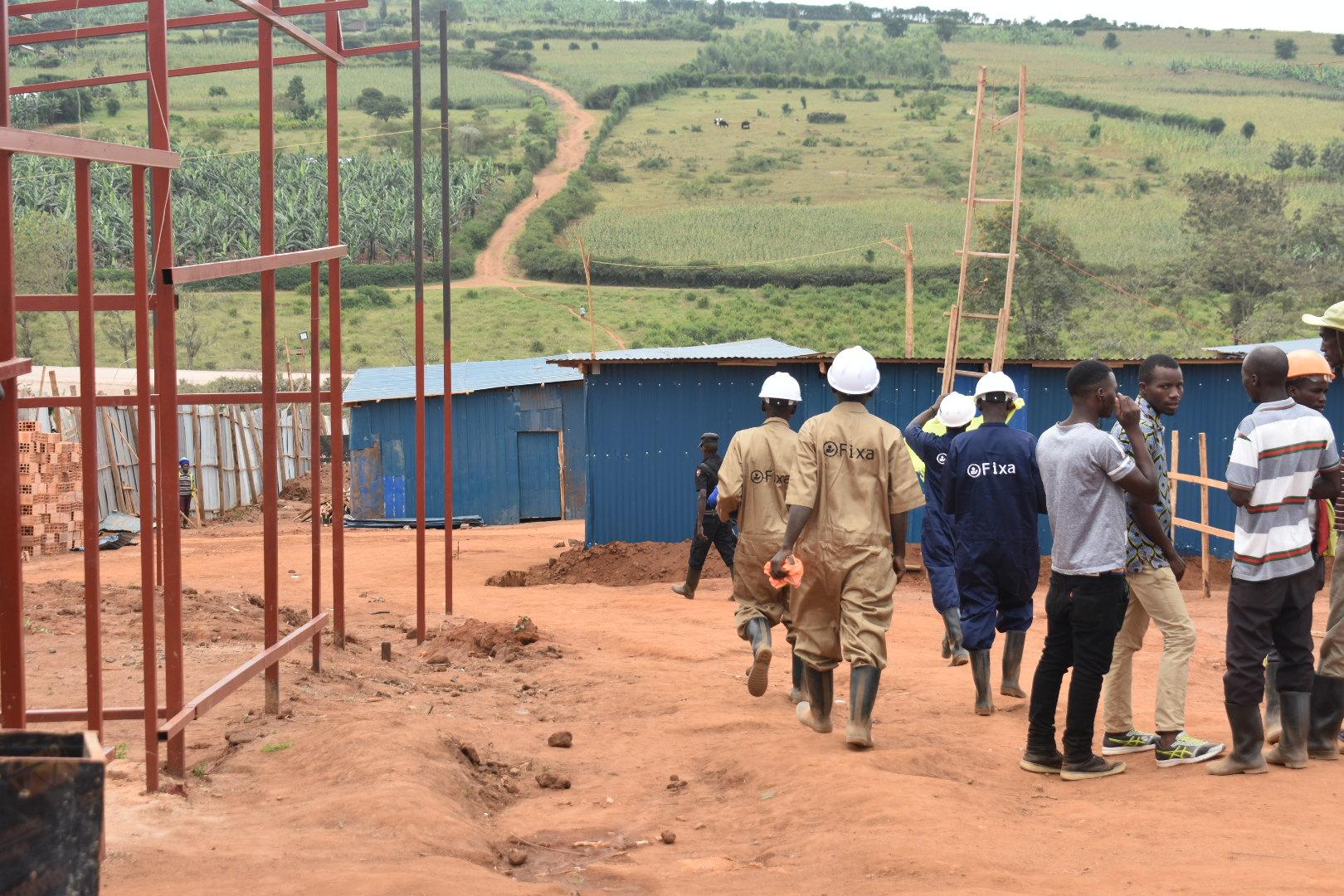Wide shot of construction workers on a job site