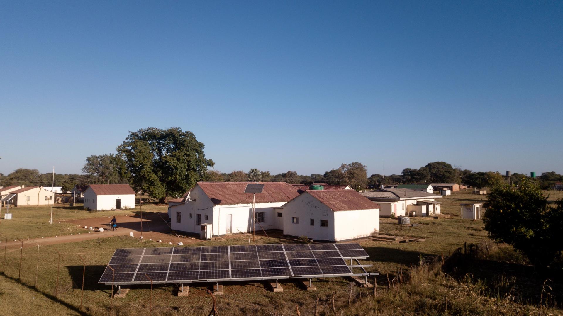 Wide shot solar panels outside health centre
