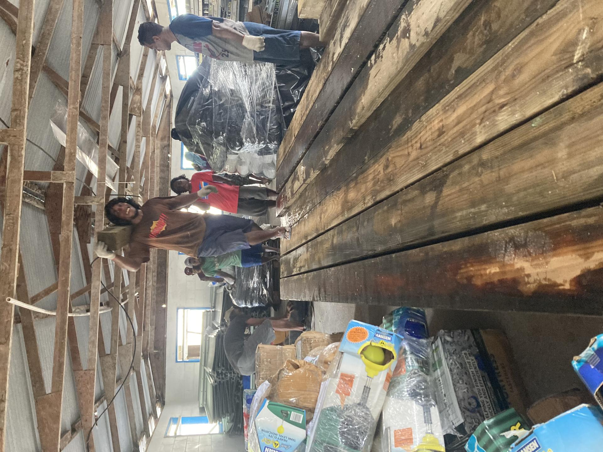 Carrying Lumbers to store in warehouse at Namu Atoll