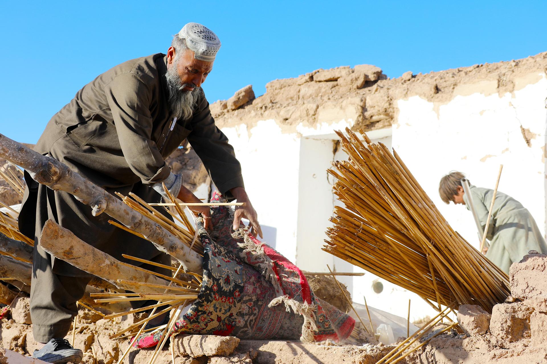 Man cleans up after the earthquake
