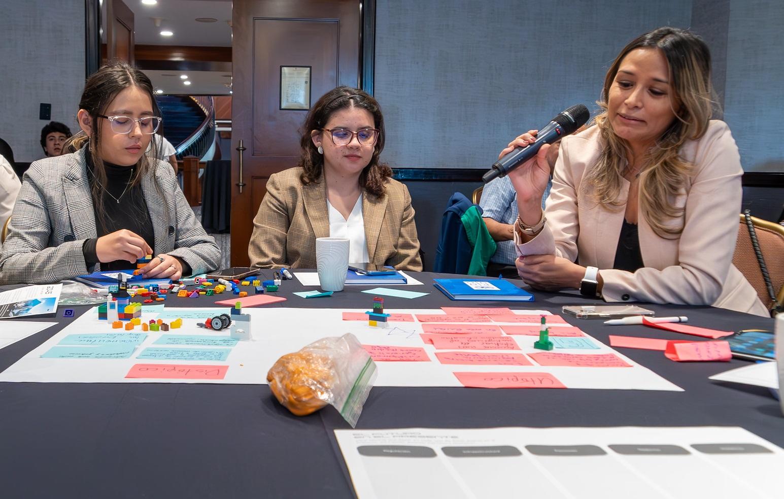 Three women participating in a Digital Readiness Assessment in Guatemala