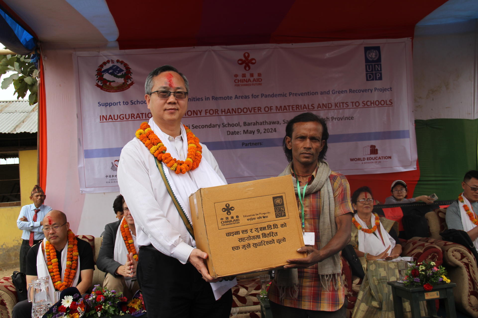 Chinese Ambassador to Nepal H.E. Chen Song at a ceremony distributing recovery materials