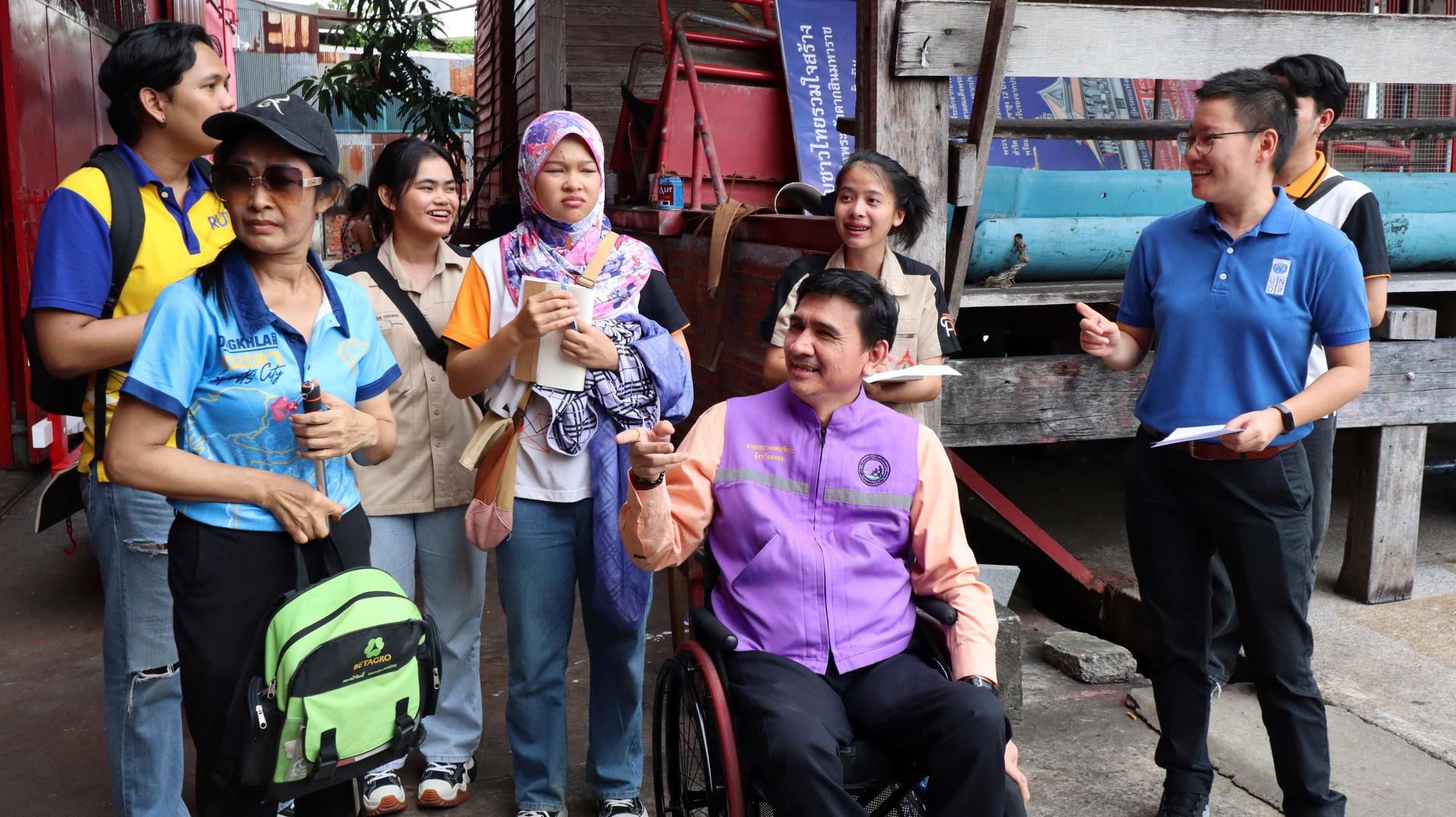 a group of people posing for the camera