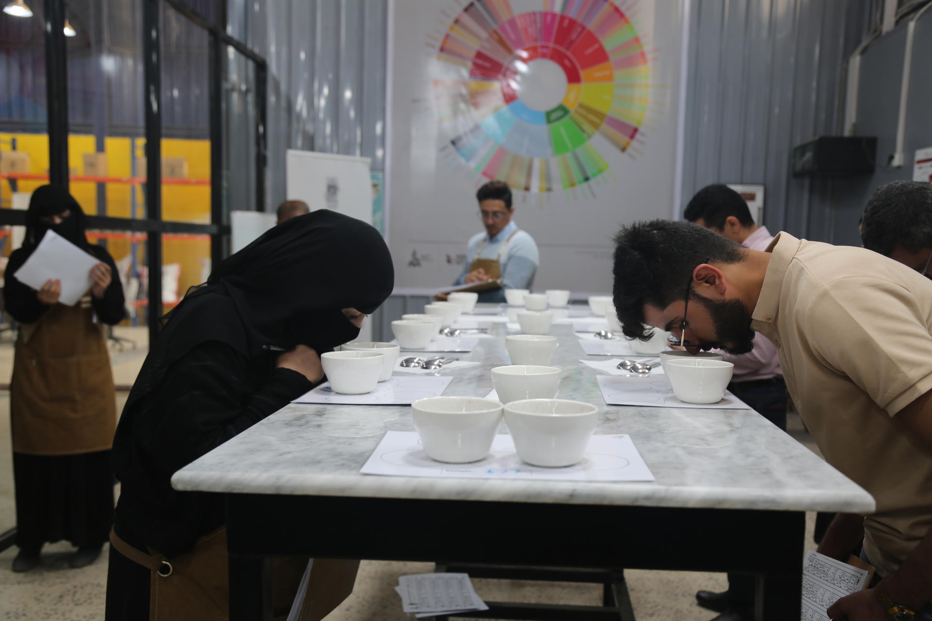 a group of people sitting at a table