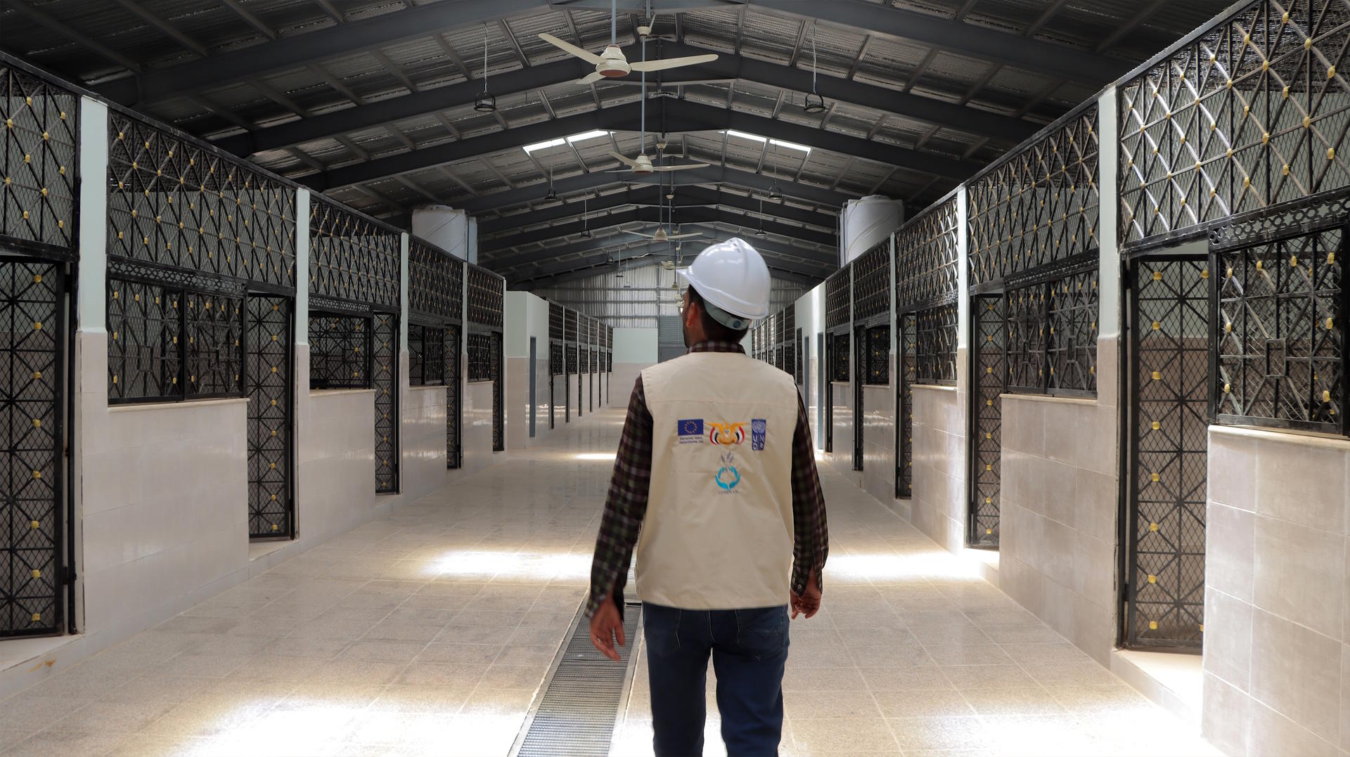 a person standing in front of a building
