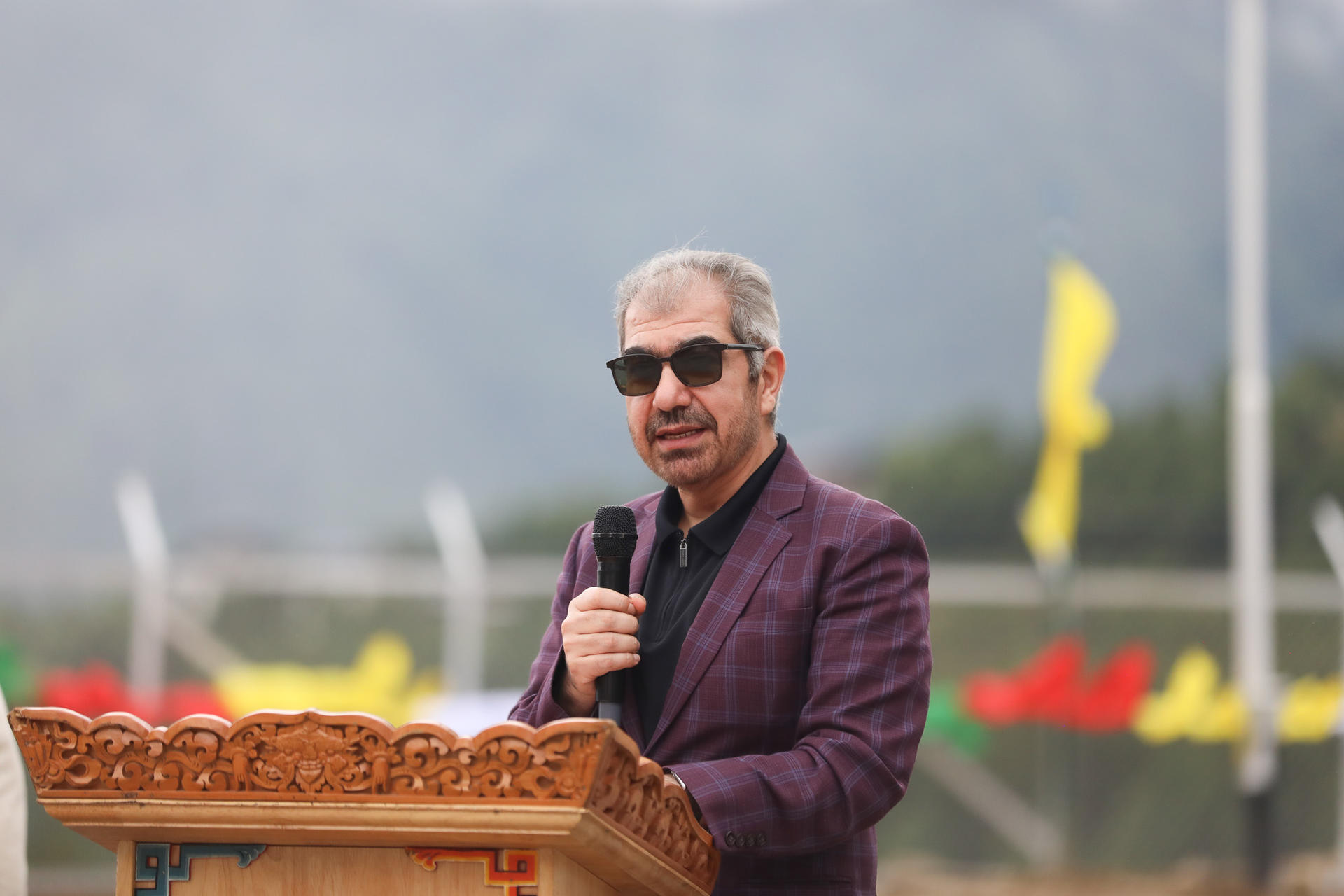 a man wearing a suit and tie