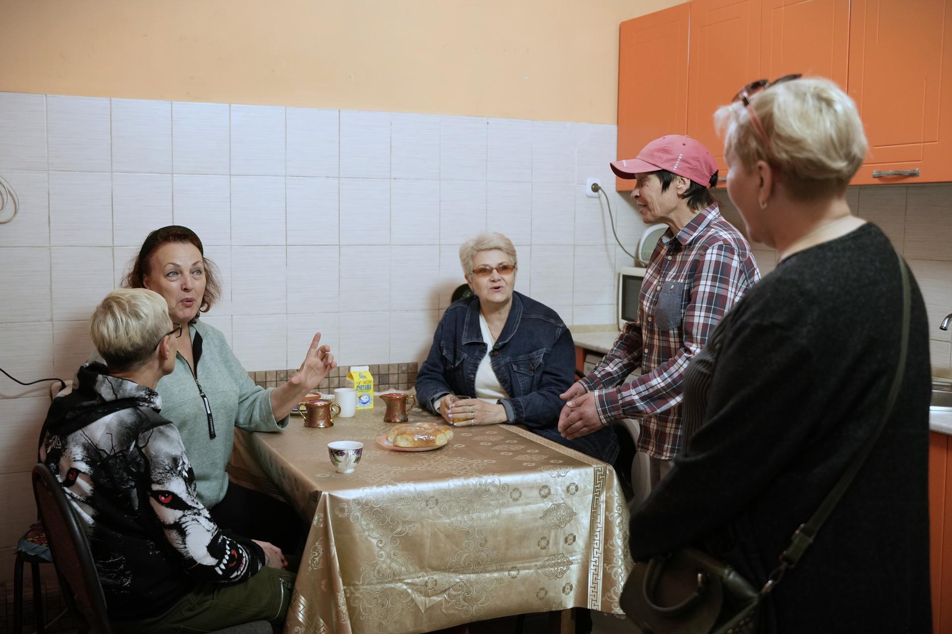 a group of people performing on a counter