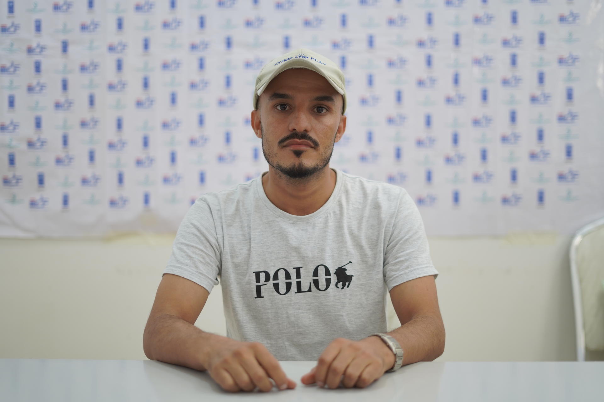 a man sitting on a table