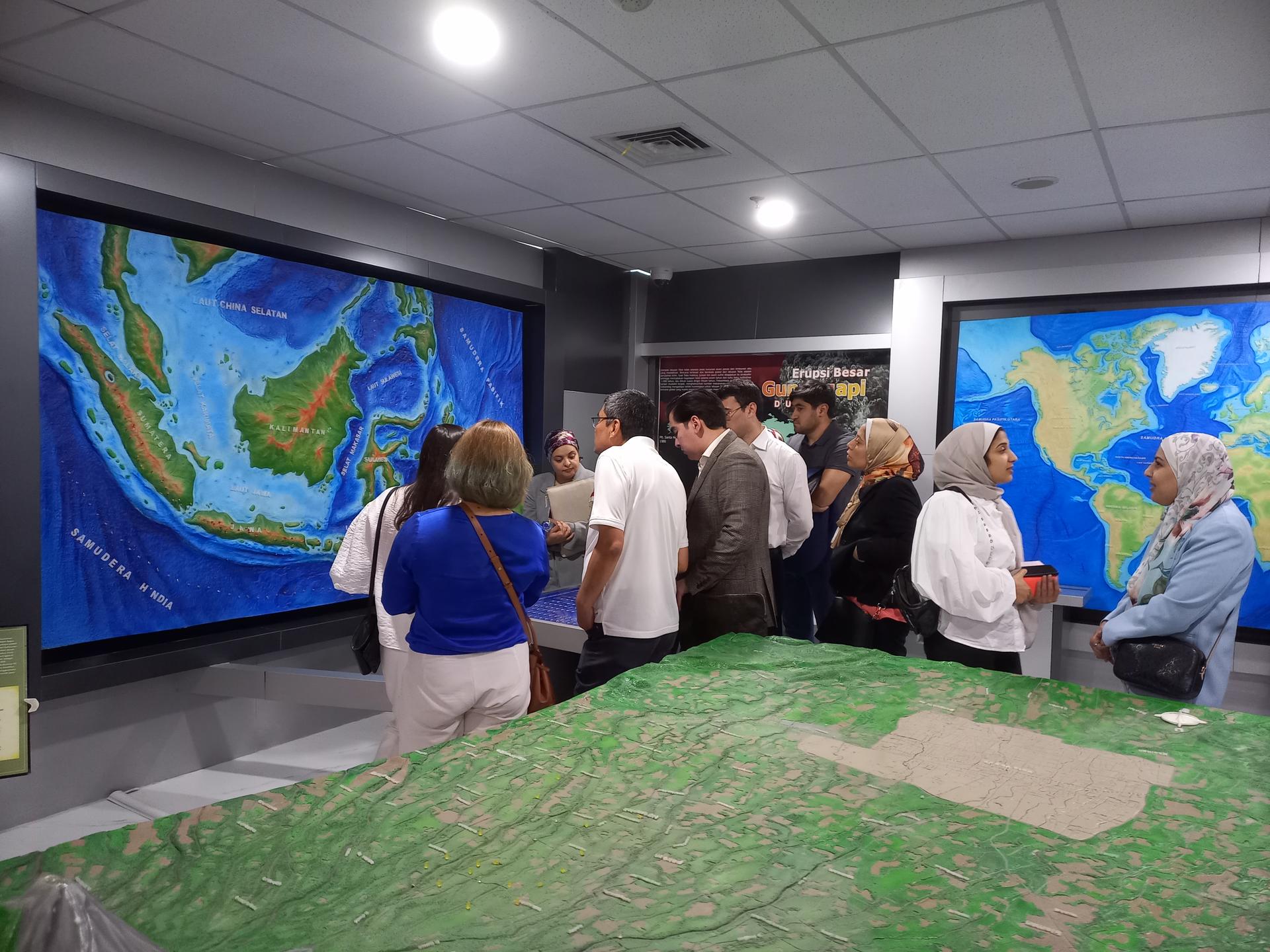 the participants of the event standing and talking to each other