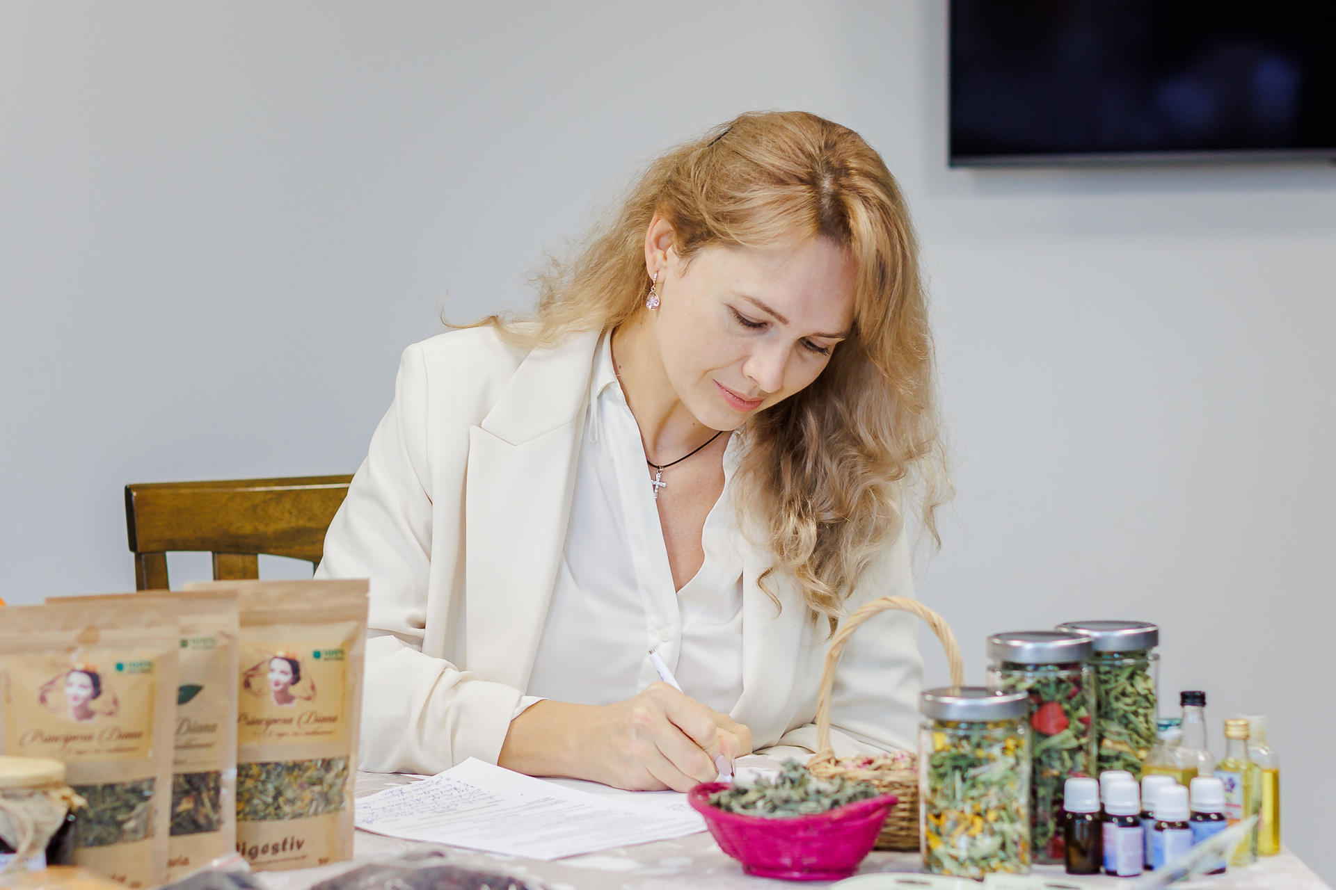 a woman sitting at a table