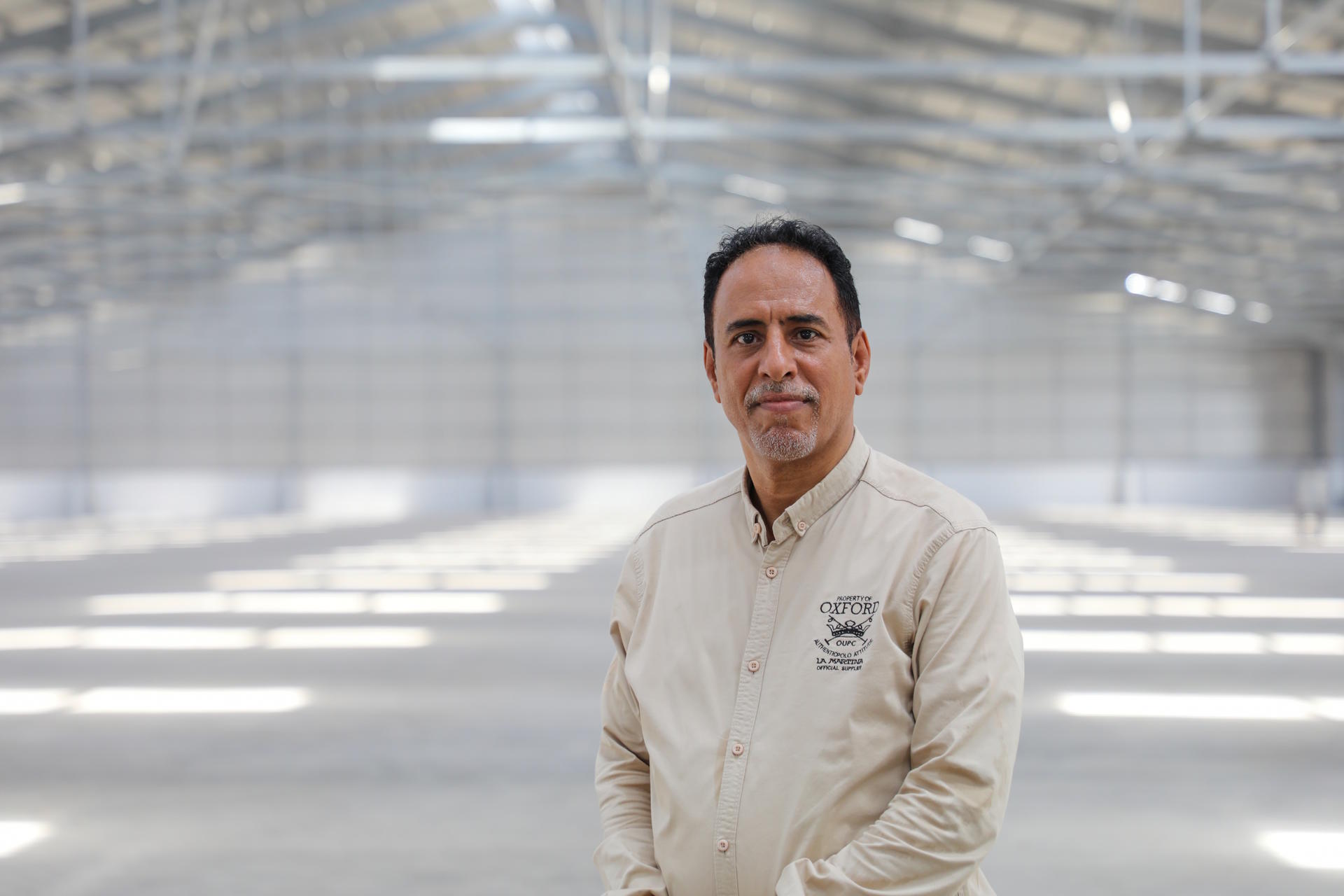 a man standing in front of a building