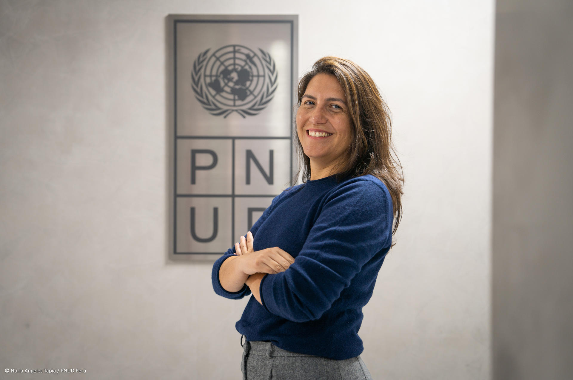 a person standing posing for the camera