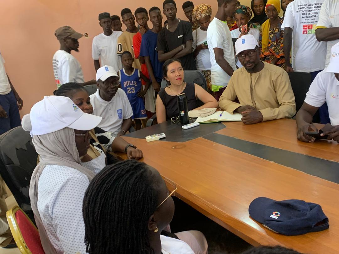 a group of people sitting at a table