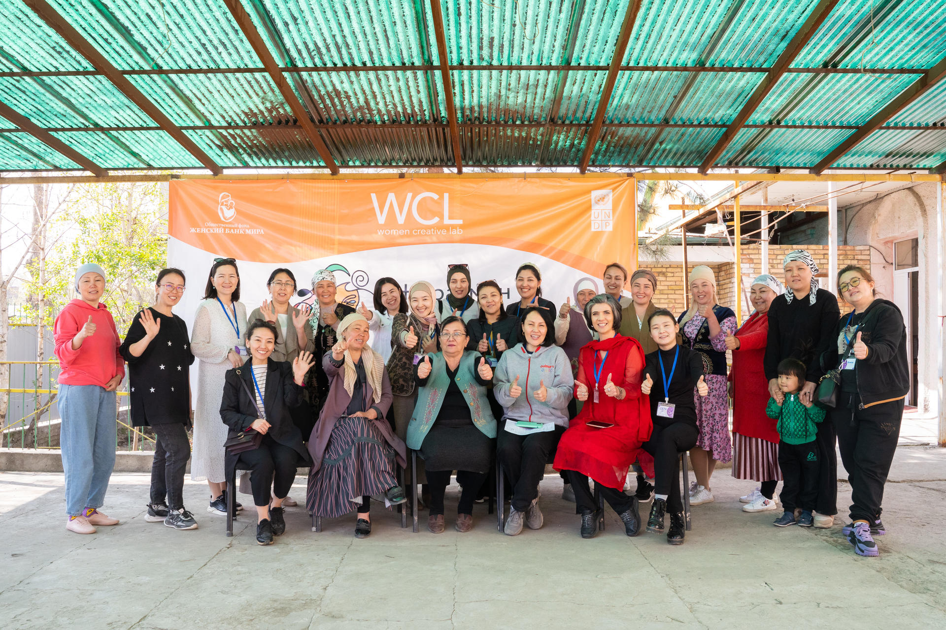 a group of people posing for the camera