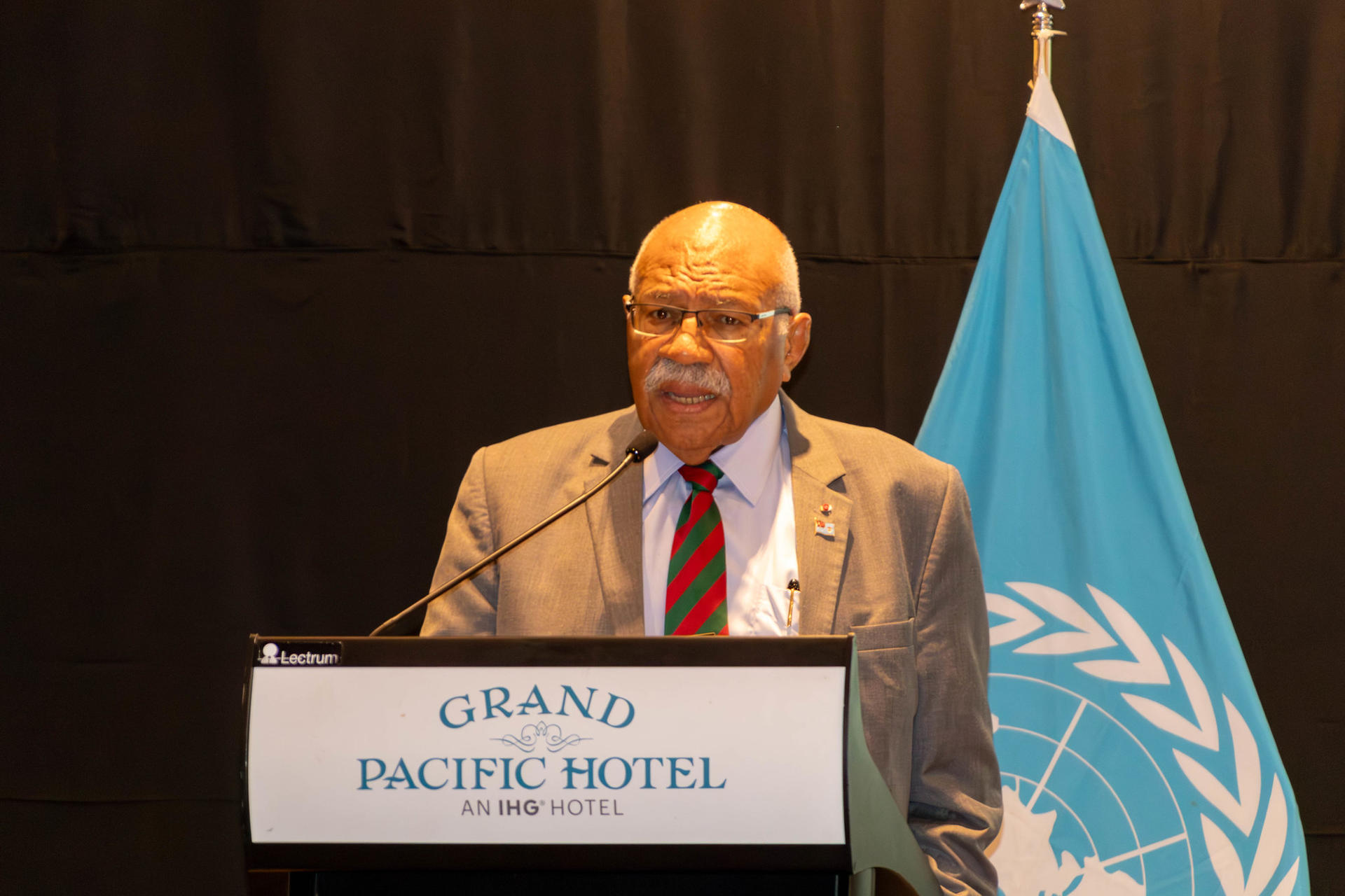 a man wearing a suit and tie