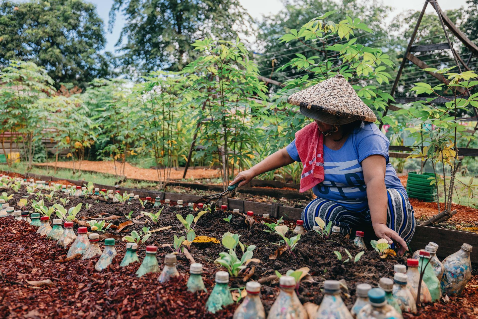 a person sitting in a garden