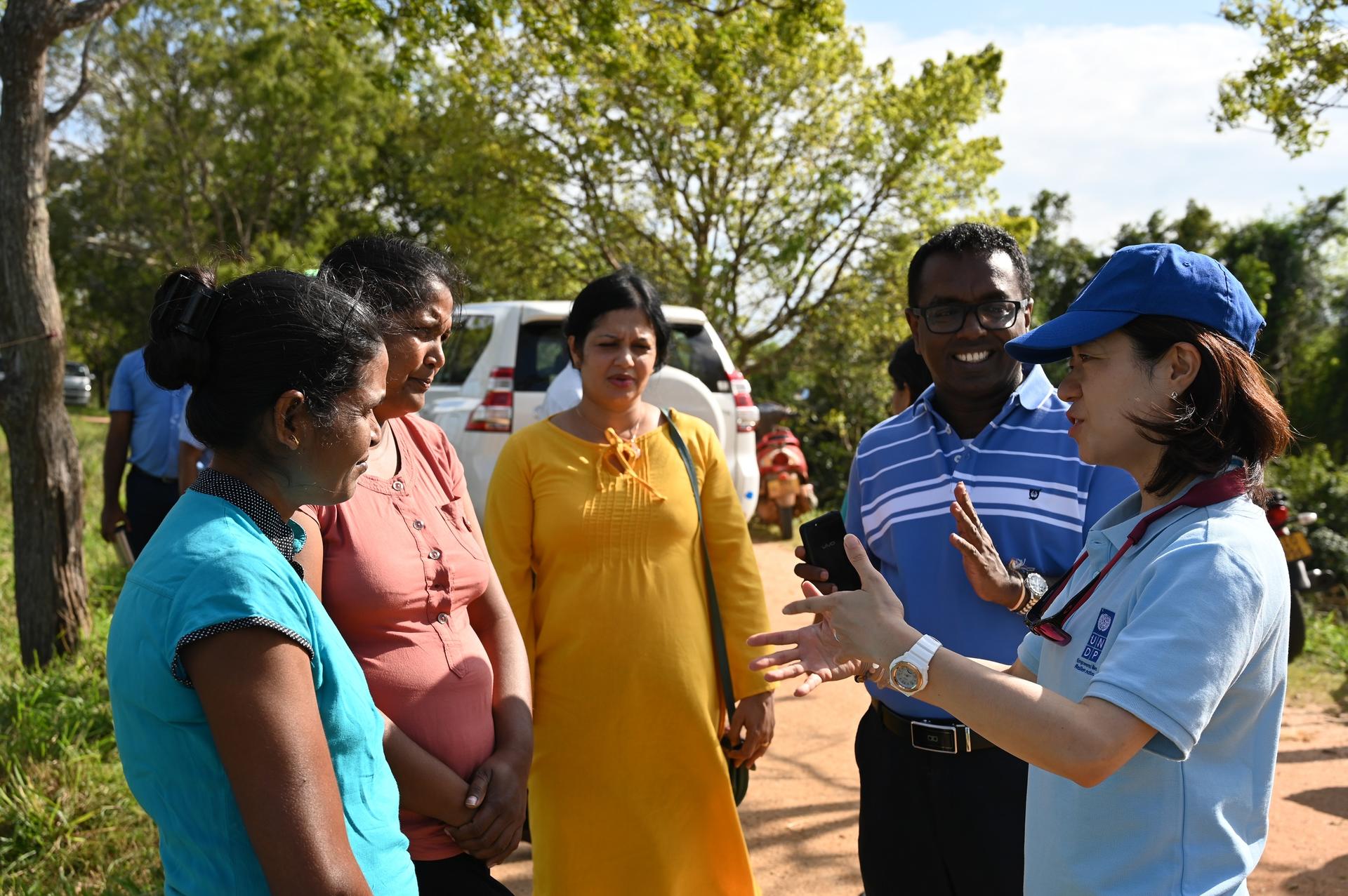 UNDP Sri Lanka Resident Representative Azusa Kubota talks with residents of the Dry Zone