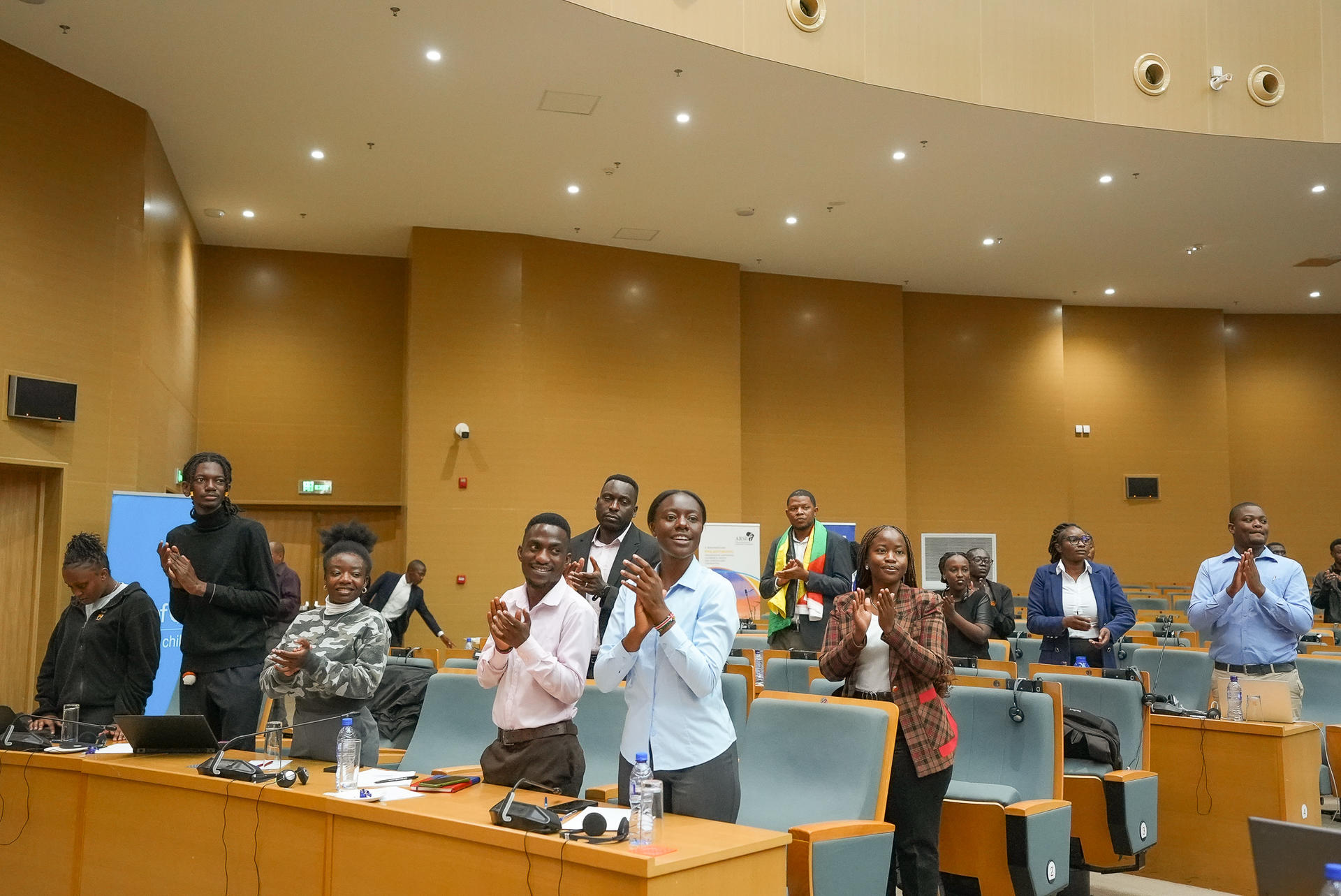 the audience standing and clapping