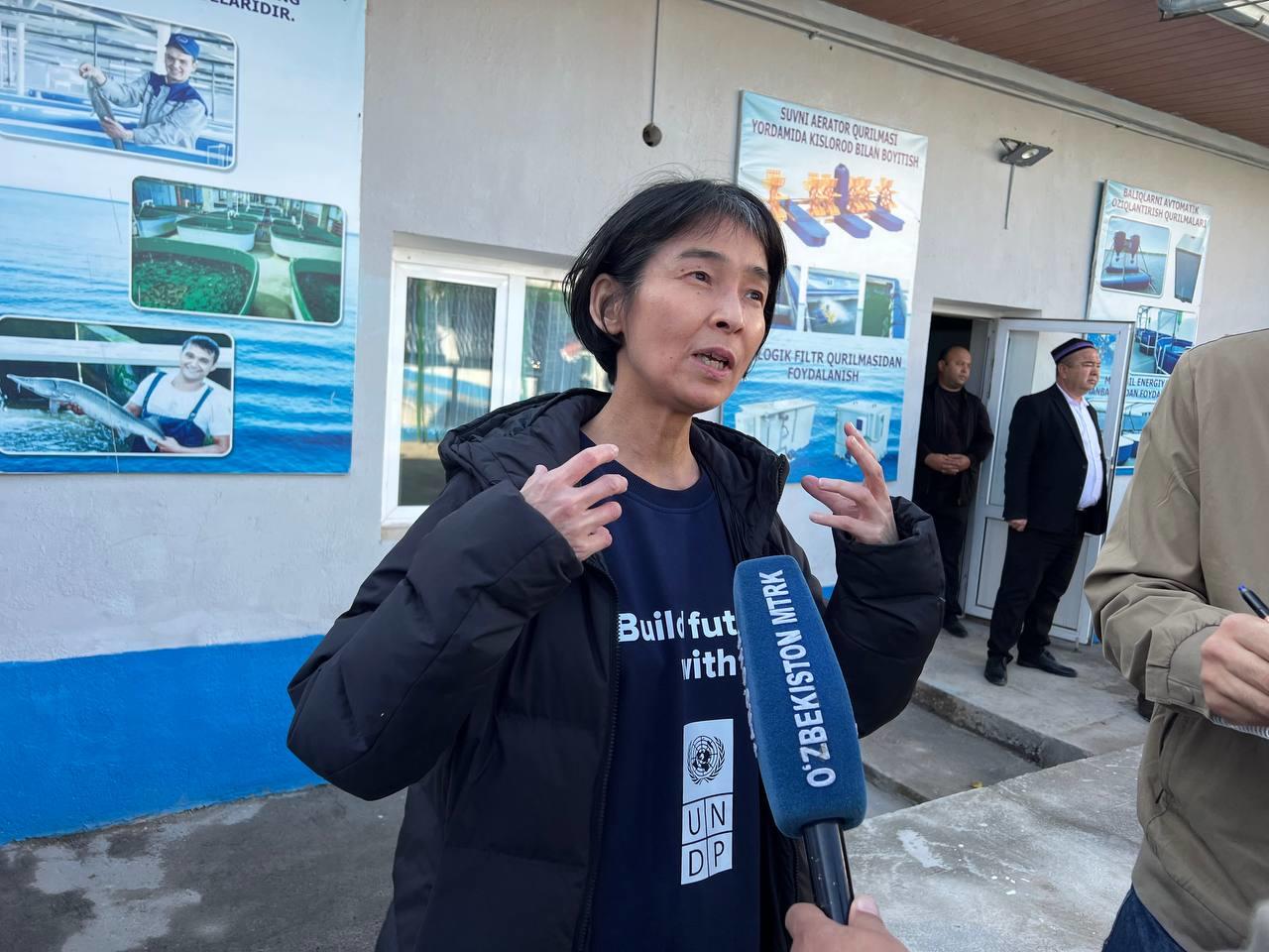 a person standing in front of a building