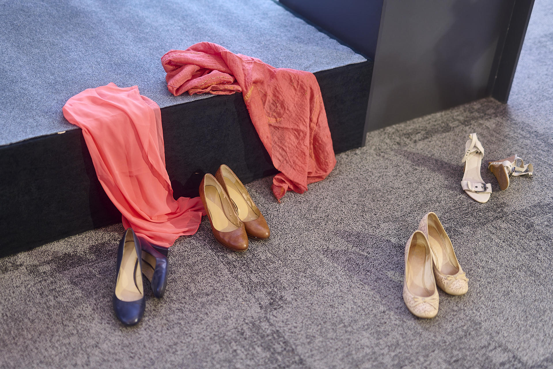 a group of shoes on the floor