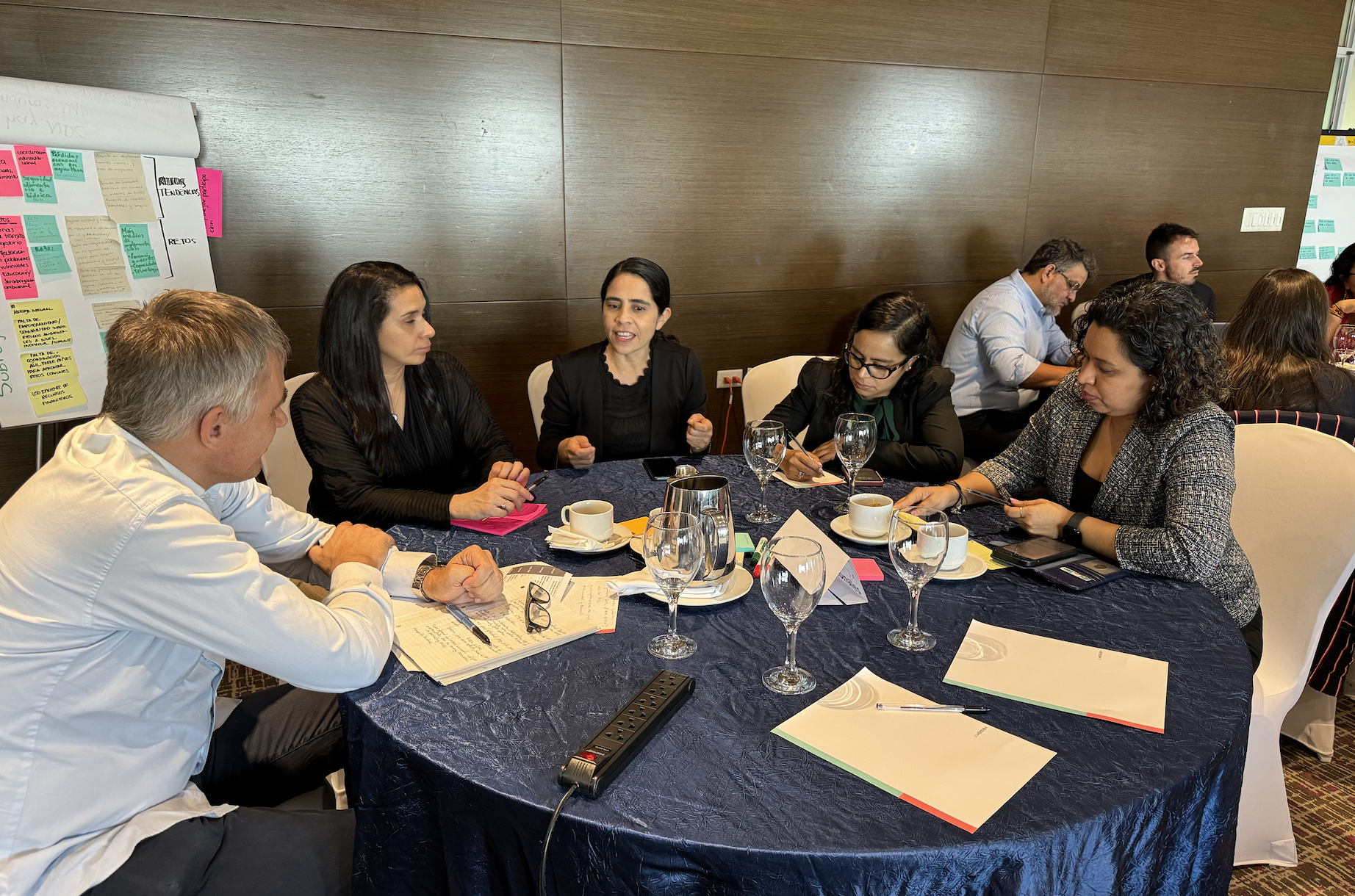 a group of people sitting at a table