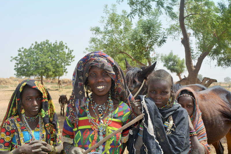 a group of people posing for the camera