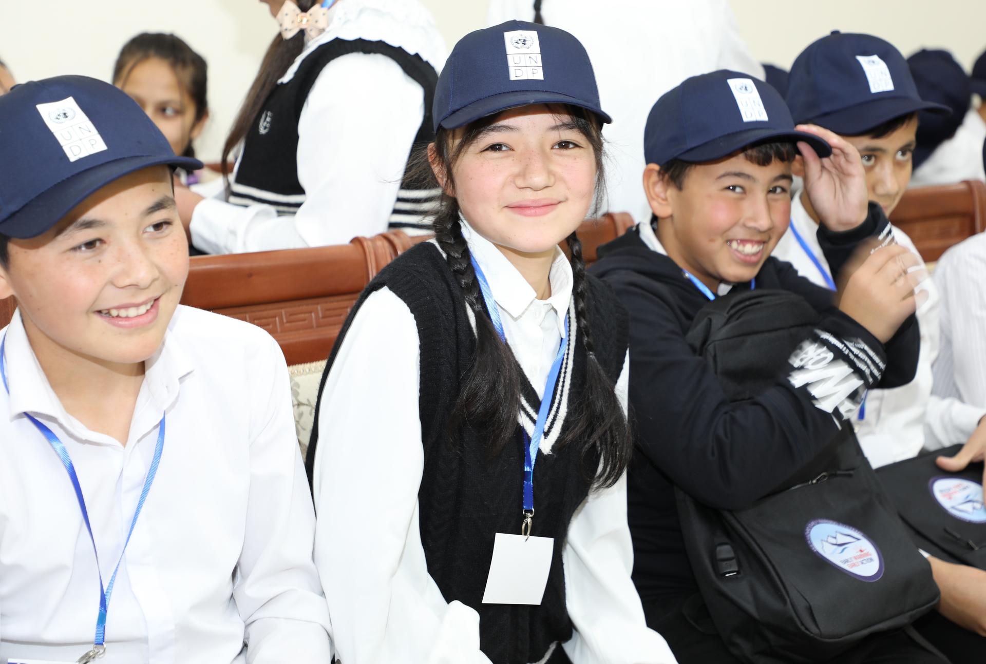 a group of people posing for the camera