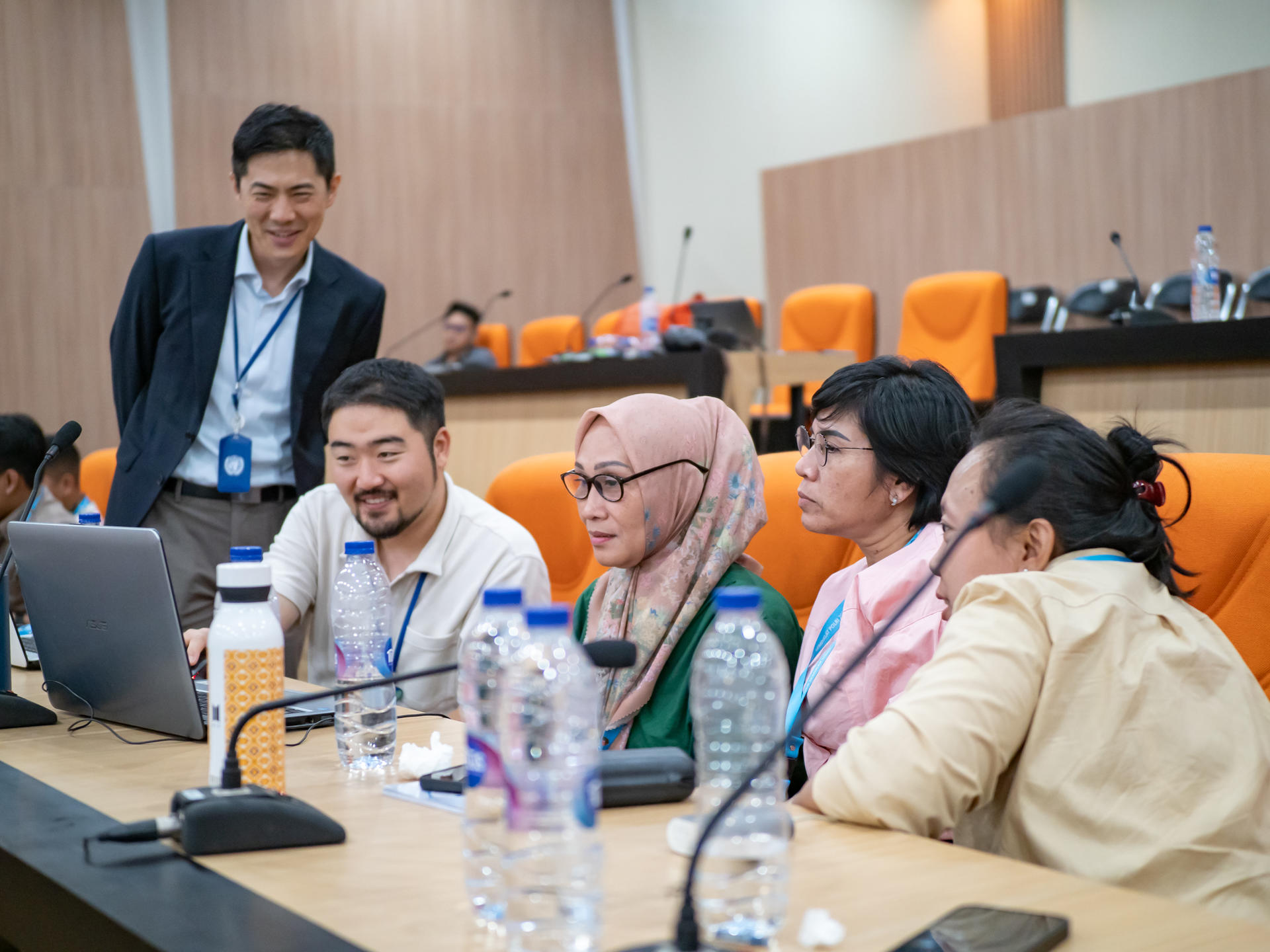 a group of people sitting at a table