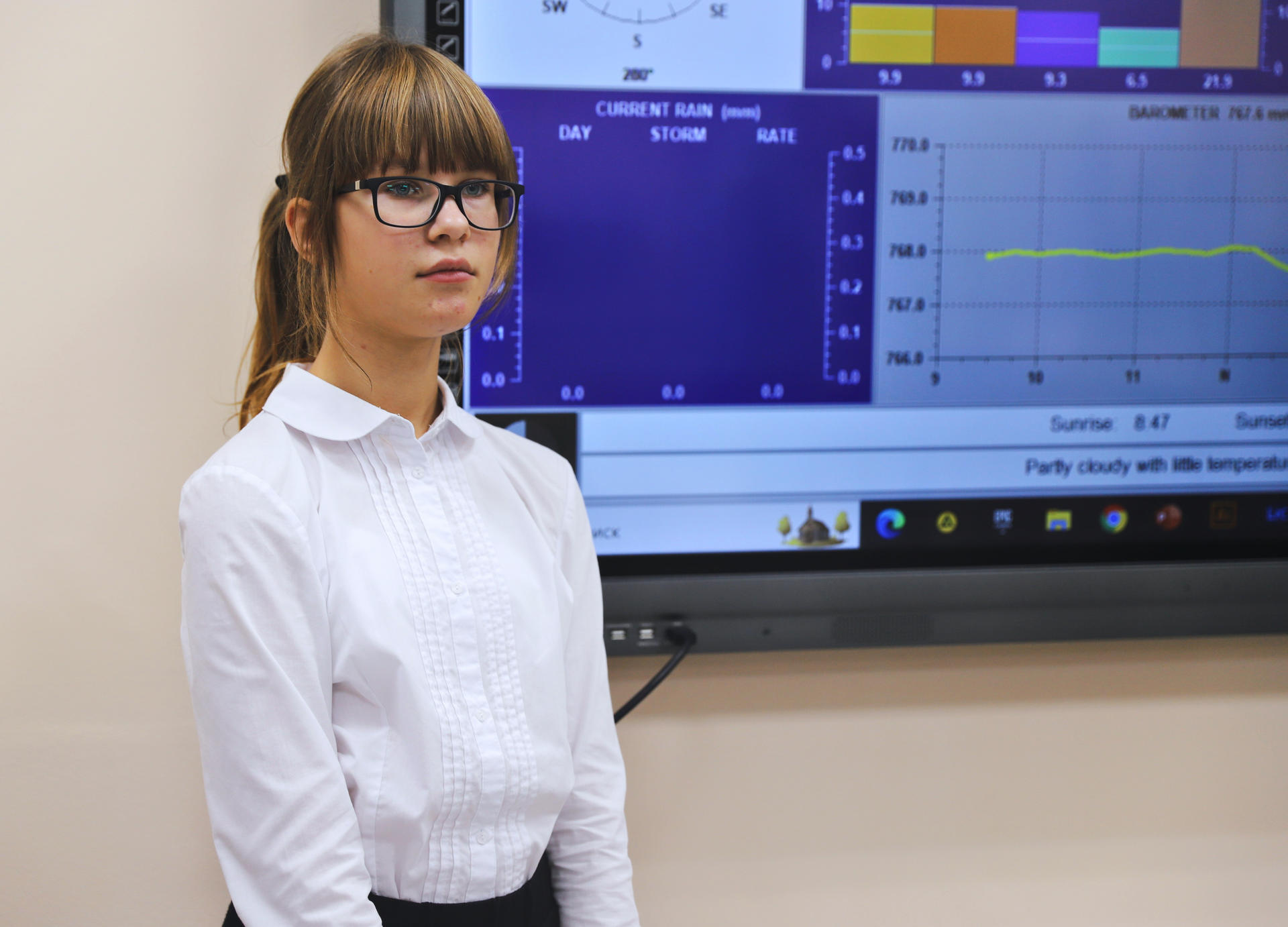 a person standing in front of a computer