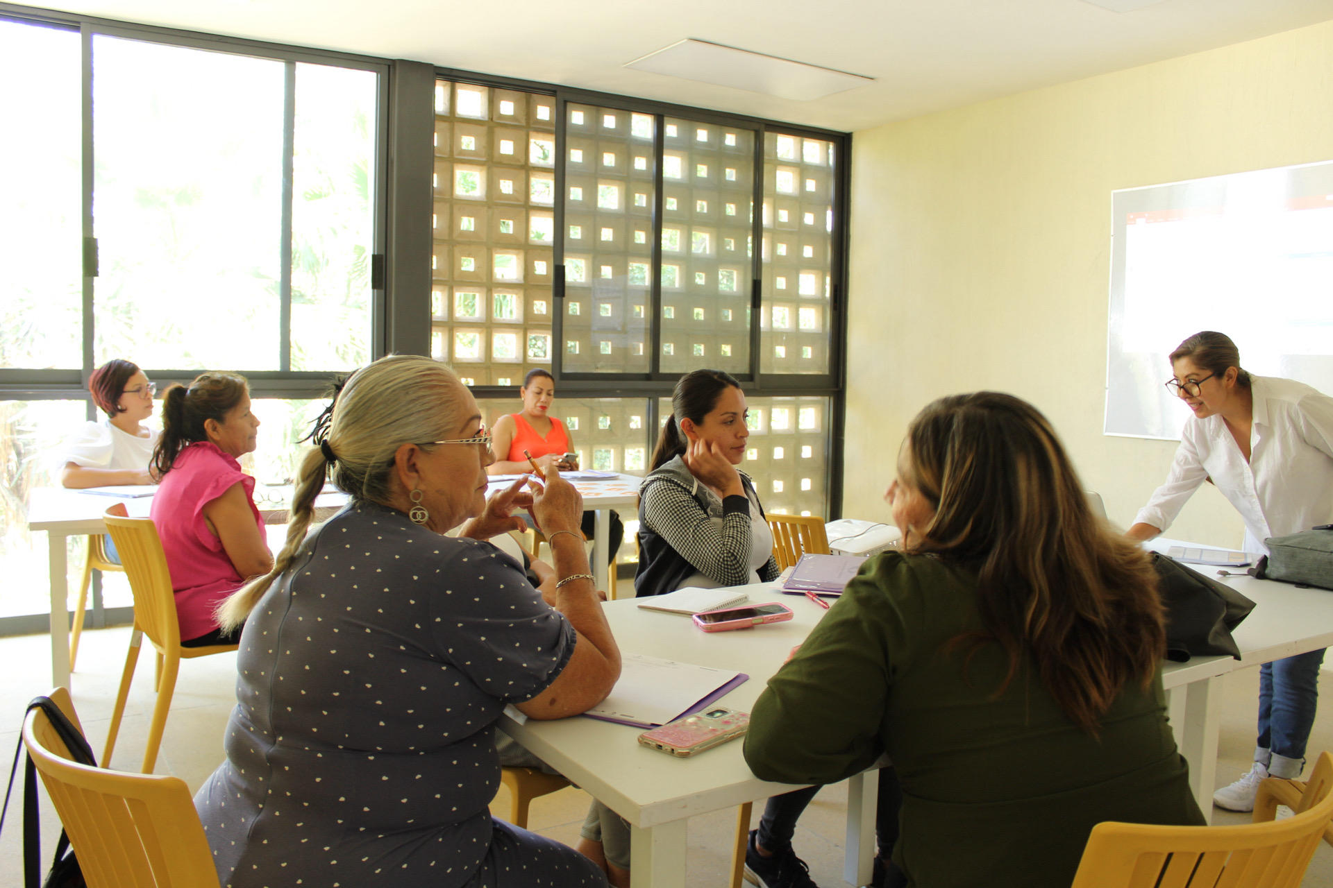 a group of people sitting at a table