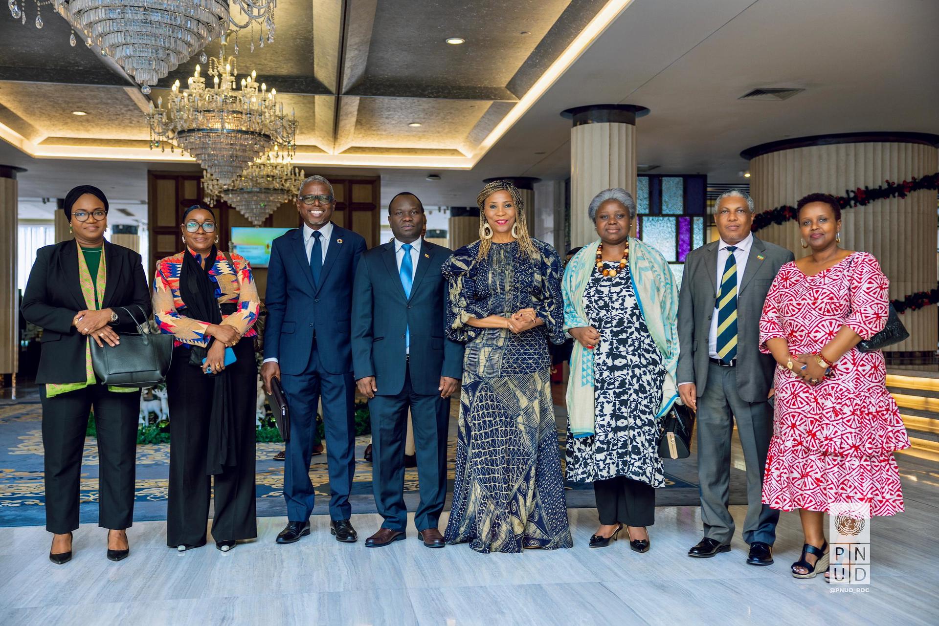 a group of people posing for the camera