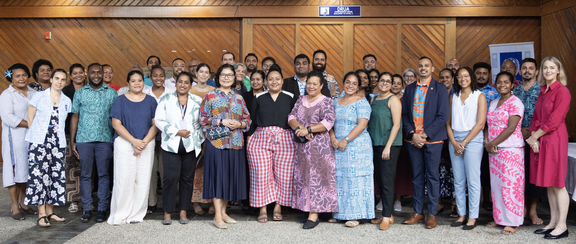 a group of people posing for a photo