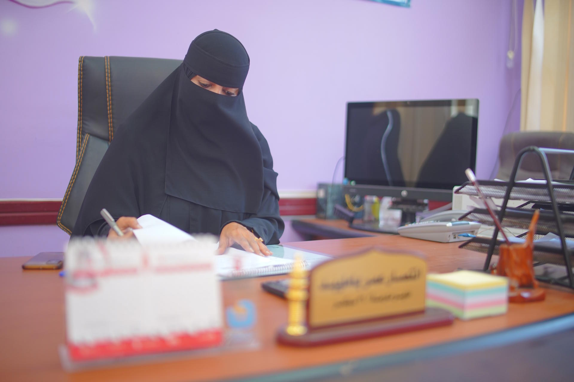 a person sitting at a desk