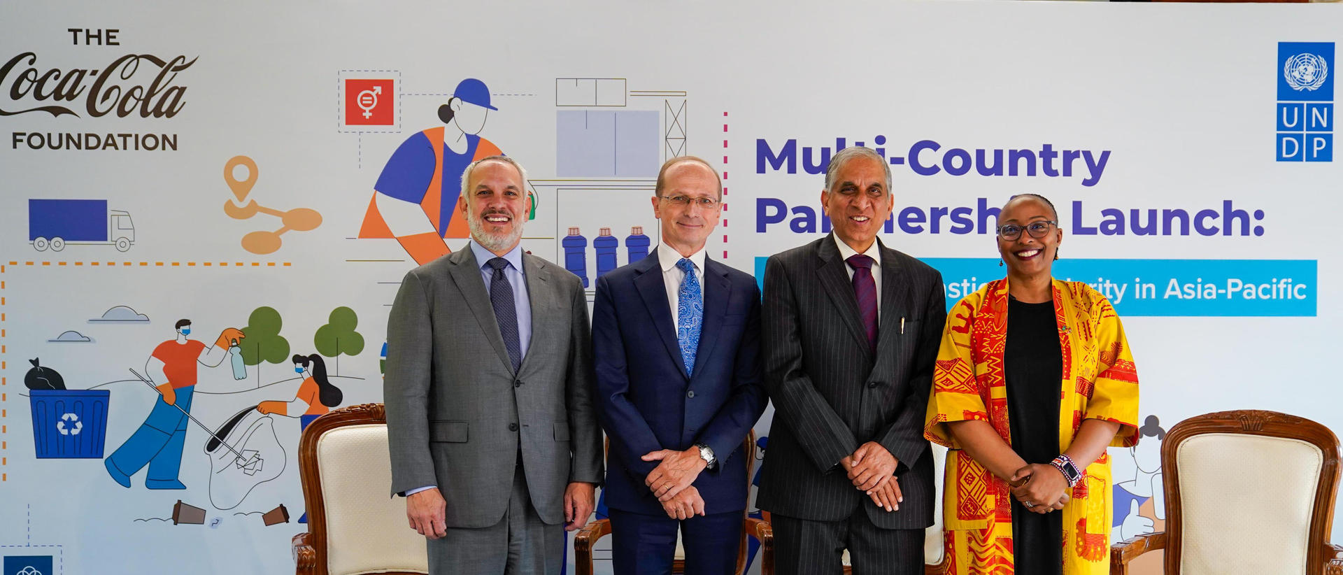 a group of people standing next to a person 