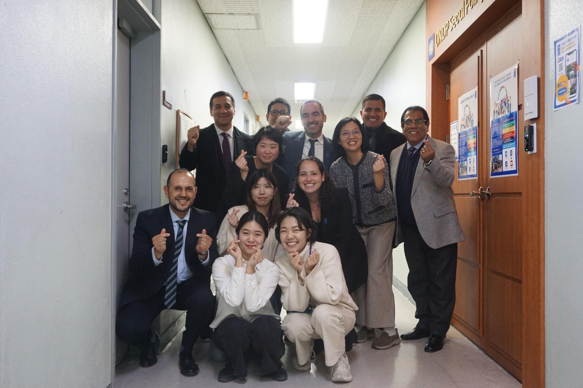 a group of people posing for a photo