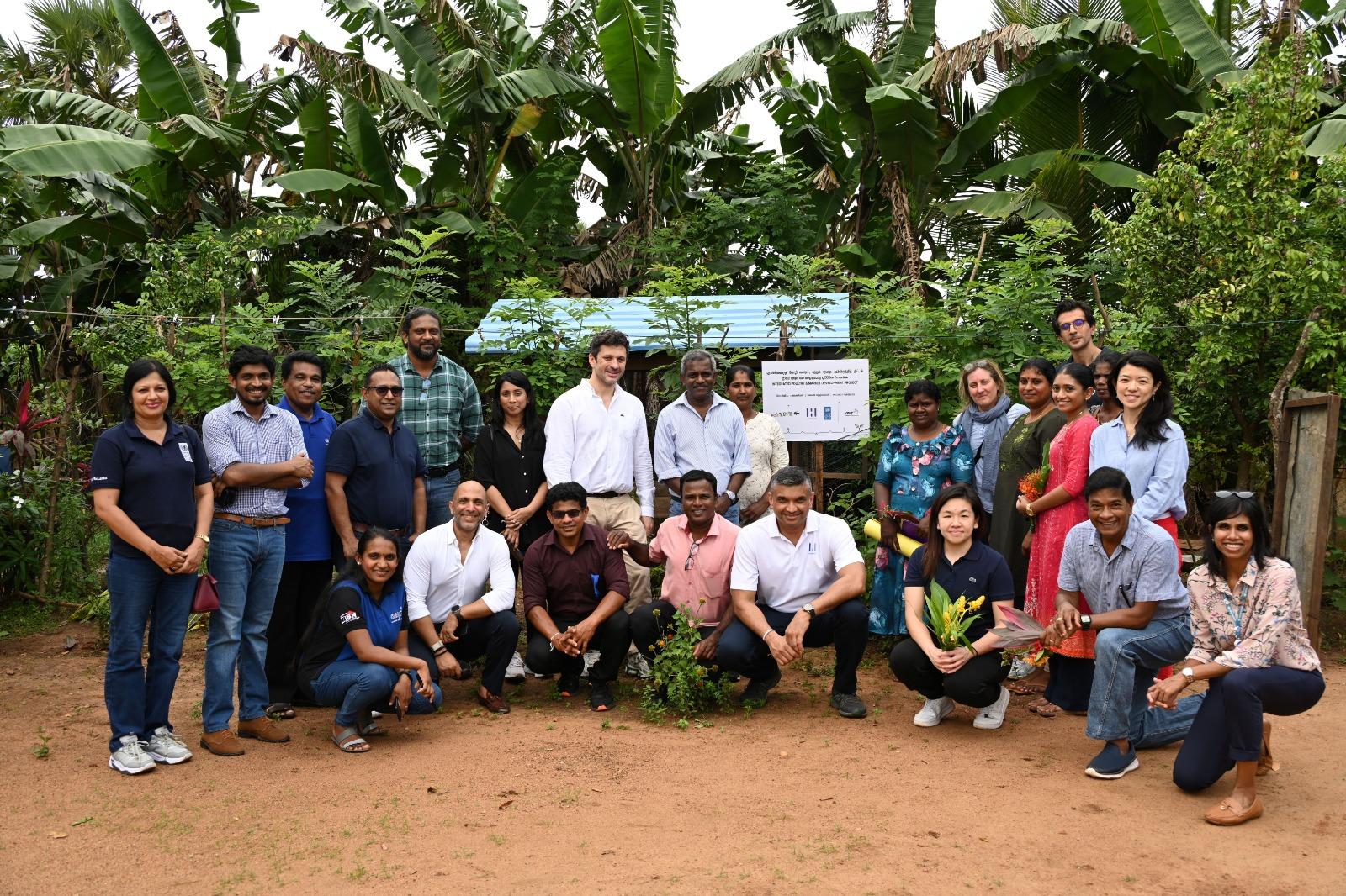 Hirdaramani, Lacoste and UNDP reps with local partners and communities