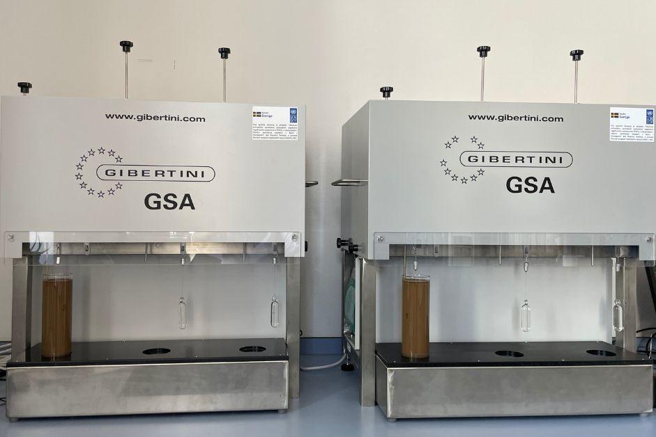 Two lab machines labeled "GSA" in a bright, clean workspace.